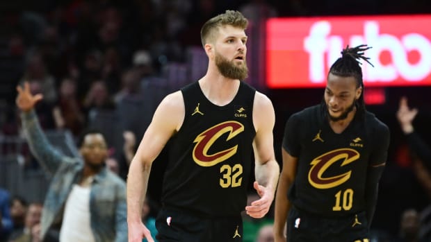 Mar 5, 2024; Cleveland, Ohio, USA; Cleveland Cavaliers forward Dean Wade (32) and guard Darius Garland (10) react after Wade hit a three-point basket during the second half against the Boston Celtics at Rocket Mortgage FieldHouse. Mandatory Credit: Ken Blaze-USA TODAY Sports